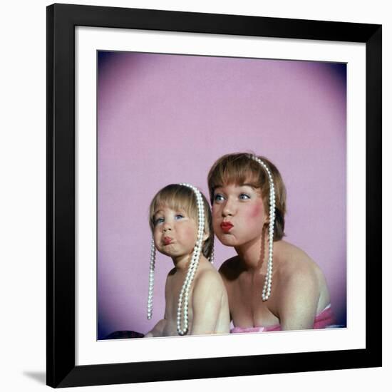 Actress Shirley MacLaine and Daughter Sachi Parker Pouting with String of Pearls on Their Heads-Allan Grant-Framed Premium Photographic Print