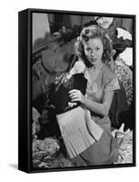 Actress Shirley Temple, Gathering Her Unwanted Clothes Together to Donate to a Clothing Drive-Martha Holmes-Framed Stretched Canvas