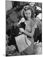 Actress Shirley Temple, Gathering Her Unwanted Clothes Together to Donate to a Clothing Drive-Martha Holmes-Mounted Premium Photographic Print