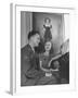 Actress Shirley Temple, Sitting at the Piano with Sgt. John Agar-null-Framed Photographic Print