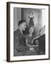 Actress Shirley Temple, Sitting at the Piano with Sgt. John Agar-null-Framed Photographic Print