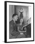 Actress Shirley Temple, Sitting at the Piano with Sgt. John Agar-null-Framed Photographic Print