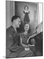 Actress Shirley Temple, Sitting at the Piano with Sgt. John Agar-null-Mounted Photographic Print