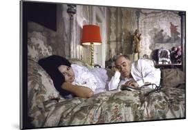 Actress Sophia Loren and Husband Carlo Ponti Lying Across a Bed Together-Alfred Eisenstaedt-Mounted Photographic Print