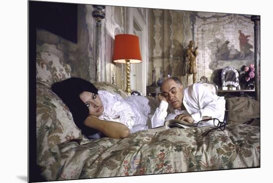 Actress Sophia Loren and Husband Carlo Ponti Lying Across a Bed Together-Alfred Eisenstaedt-Mounted Premium Photographic Print