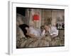 Actress Sophia Loren and Husband, Producer Carlo Ponti, Lying across a Bed Together-Alfred Eisenstaedt-Framed Premium Photographic Print