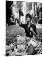 Actress Sophia Loren Examining Contents of Bottle During Location Filming of "Madame Sans Gene"-Alfred Eisenstaedt-Mounted Premium Photographic Print