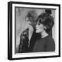 Actress, Tammy Grimes, Posing in Front of Portrait by Rene Bouche-Dmitri Kessel-Framed Premium Photographic Print