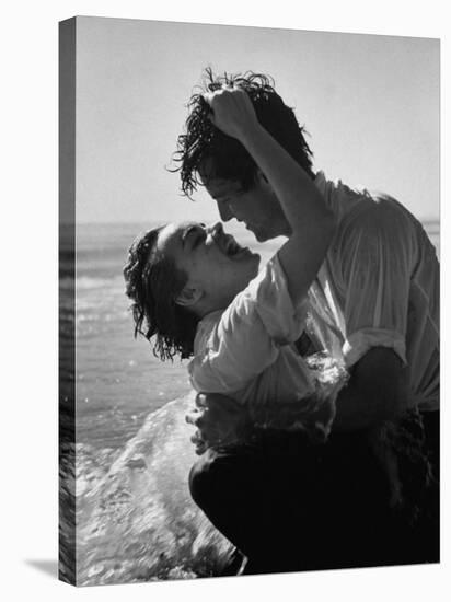 Actress Terry Moore Hugging Actor Robert Wagner on the Beach-George Silk-Stretched Canvas
