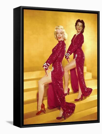 Actresses Marilyn Monroe and Jane Russell Wearing Gowns Designed by Travilla Pose for Publicity-Ed Clark-Framed Stretched Canvas