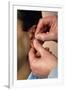 Acupuncturist's Hands Insert Needle Into Man's Ear-Damien Lovegrove-Framed Photographic Print