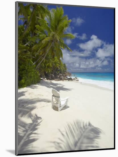 Adirondack Chair and Tropical Beach, Seychelles, Indian Ocean, Africa-Sakis Papadopoulos-Mounted Photographic Print