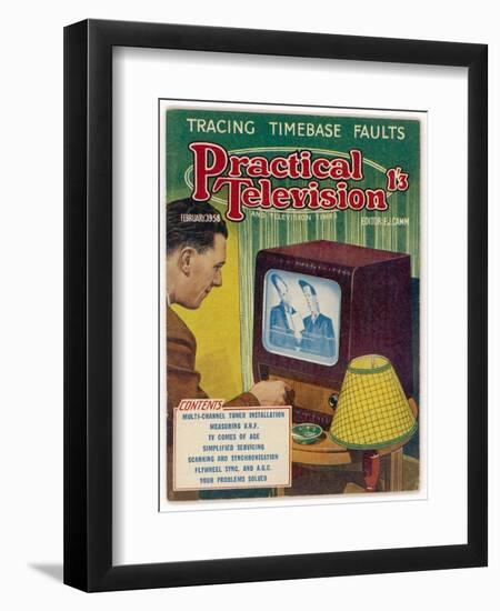 Adjusting an Early Television Set-null-Framed Art Print