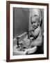 Adorable Baby Brushing Teeth While Sitting in Sink-null-Framed Photographic Print