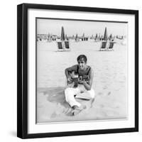 Adriano Celentano with the Guitar at the Beach-Marisa Rastellini-Framed Photographic Print