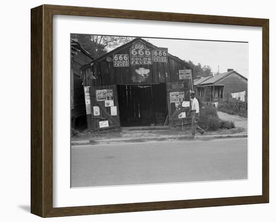 Advertisements for Popular Malaria Cure, Natchez, Mississippi, c.1935-Ben Shahn-Framed Photo