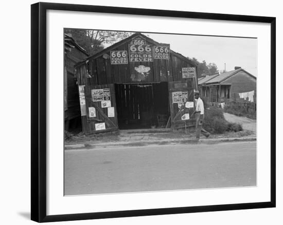 Advertisements for Popular Malaria Cure, Natchez, Mississippi, c.1935-Ben Shahn-Framed Photo