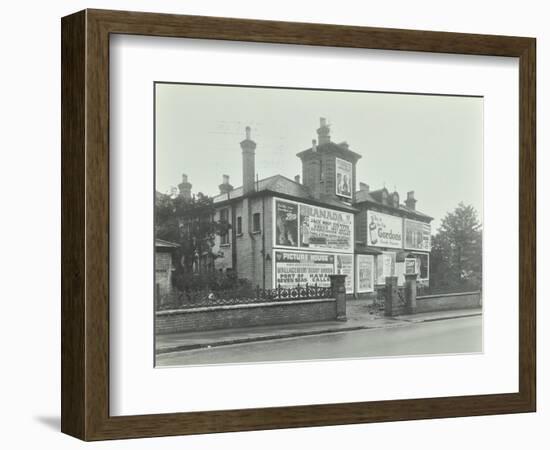 Advertising Hoardings on the Wall of a Building, Wandsworth, London, 1938-null-Framed Photographic Print