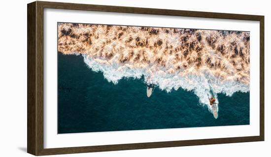 Aerial drone photo of surfers riding Pacific Ocean waves in San Diego, California at Sunset Cliffs-David Chang-Framed Photographic Print