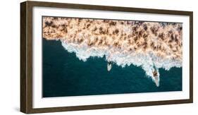 Aerial drone photo of surfers riding Pacific Ocean waves in San Diego, California at Sunset Cliffs-David Chang-Framed Photographic Print