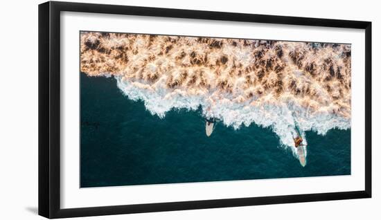 Aerial drone photo of surfers riding Pacific Ocean waves in San Diego, California at Sunset Cliffs-David Chang-Framed Photographic Print