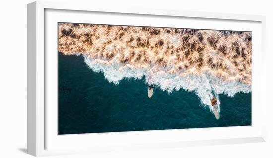 Aerial drone photo of surfers riding Pacific Ocean waves in San Diego, California at Sunset Cliffs-David Chang-Framed Photographic Print