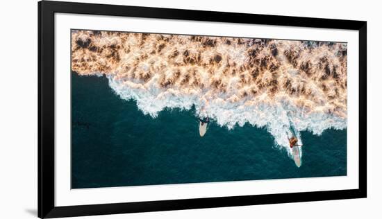 Aerial drone photo of surfers riding Pacific Ocean waves in San Diego, California at Sunset Cliffs-David Chang-Framed Photographic Print