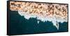 Aerial drone photo of surfers riding Pacific Ocean waves in San Diego, California at Sunset Cliffs-David Chang-Framed Stretched Canvas