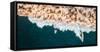 Aerial drone photo of surfers riding Pacific Ocean waves in San Diego, California at Sunset Cliffs-David Chang-Framed Stretched Canvas