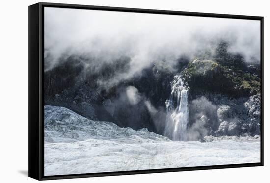 Aerial of a Waterfall Flowing into the Icefield of Fox Glacier-Michael Runkel-Framed Stretched Canvas