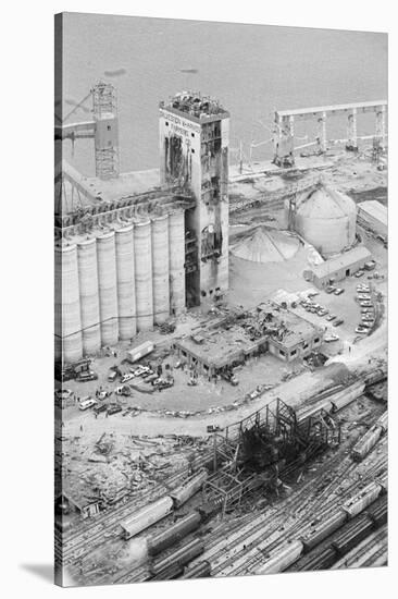Aerial of Exploded Grain Elevator-null-Stretched Canvas