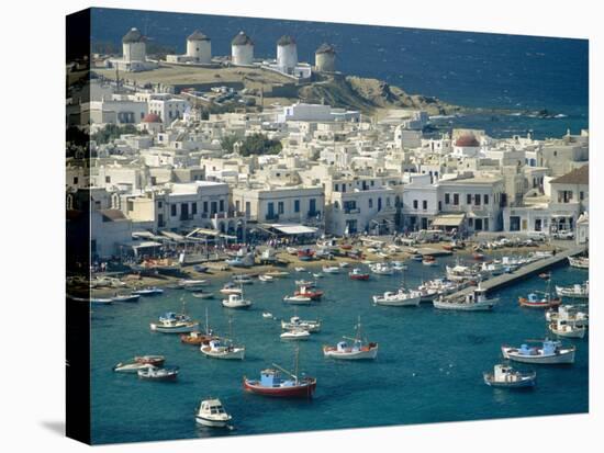 Aerial of the Harbour and Mykonos Town with Windmills in the Background, Greece-Fraser Hall-Stretched Canvas