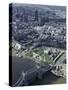 Aerial of Tower Bridge, Tower of London and the City of London, London, England-Adam Woolfitt-Stretched Canvas