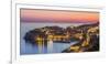 Aerial panorama of Dubrovnik Old Town at night with orange sunset sky, UNESCO World Heritage Site, -Neale Clark-Framed Photographic Print