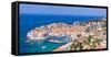 Aerial panorama of Old Port and Dubrovnik Old town, UNESCO World Heritage Site, Dubrovnik, Dalmatia-Neale Clark-Framed Stretched Canvas