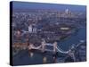 Aerial Photo Showing Tower Bridge, River Thames and Canary Wharf at Dusk, London, England-Charles Bowman-Stretched Canvas