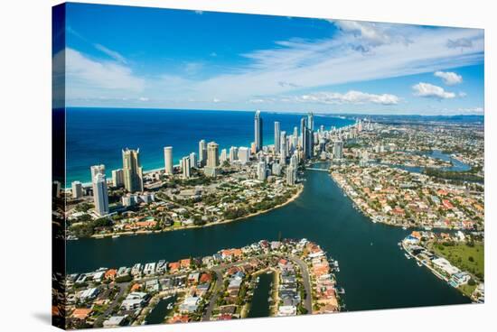 Aerial photograph of the Surfers Paradise skyline, Gold Coast, Queensland, Australia-Mark A Johnson-Stretched Canvas