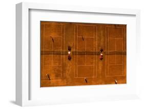 Aerial Shot of a Tennis Courts with Players in Warm Evening Sunlight-l i g h t p o e t-Framed Photographic Print