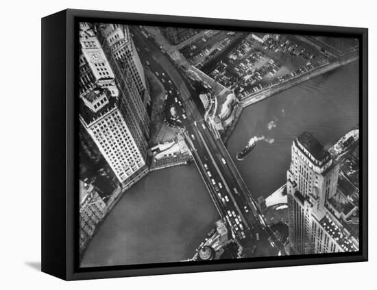 Aerial View of a Bridge Crossing a River Flowing Through the City-Margaret Bourke-White-Framed Stretched Canvas