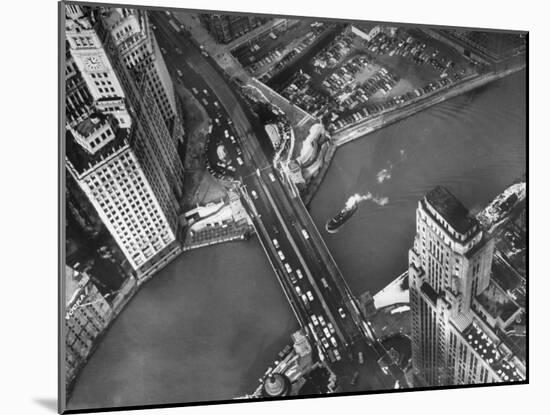 Aerial View of a Bridge Crossing a River Flowing Through the City-Margaret Bourke-White-Mounted Photographic Print