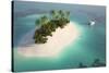 Aerial View of a Caribbean Desert Island in a Turquoise Water with a Woman Diving and a Yacht as a-Pablo Scapinachis-Stretched Canvas