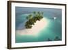 Aerial View of a Caribbean Desert Island in a Turquoise Water with a Woman Diving and a Yacht as a-Pablo Scapinachis-Framed Art Print