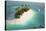 Aerial View of a Caribbean Desert Island in a Turquoise Water with a Woman Diving and a Yacht as a-Pablo Scapinachis-Stretched Canvas
