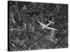 Aerial View of a Dc-4 Passenger Plane in Flight over Manhattan-Margaret Bourke-White-Stretched Canvas