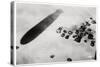 Aerial View of a Desert Settlement, with a Shadow Cast by a Zeppelin, 1931-null-Stretched Canvas
