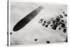 Aerial View of a Desert Settlement, with a Shadow Cast by a Zeppelin, 1931-null-Stretched Canvas