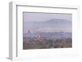 Aerial View of Ancient Temples of Bagan at Sunrise with Mount Popa in Background, Myanmar-Harry Marx-Framed Photographic Print