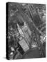 Aerial View of Buildings and a Bridge Crossing a River Flowing Through the City-Margaret Bourke-White-Stretched Canvas