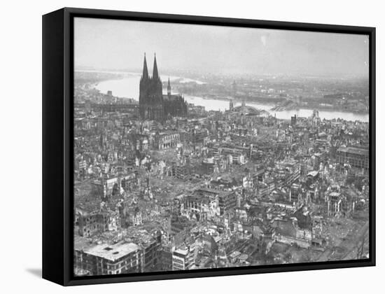 Aerial View of Cologne Showing Devastation of Allied Air Raids, Cathedral and Rhine River-John Florea-Framed Stretched Canvas