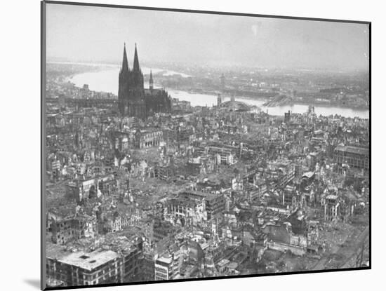 Aerial View of Cologne Showing Devastation of Allied Air Raids, Cathedral and Rhine River-John Florea-Mounted Photographic Print